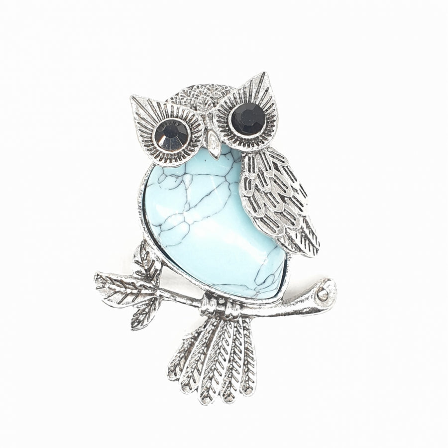 Turquoise Pendant with Gemstone Eyes